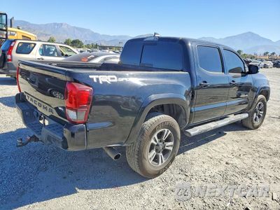 Trzecie zdjęcie samochodu z tyłu: 2019 TOYOTA TACOMA TRD SPORT VIN:3TMAZ5CNXKM107698 - miniatura
