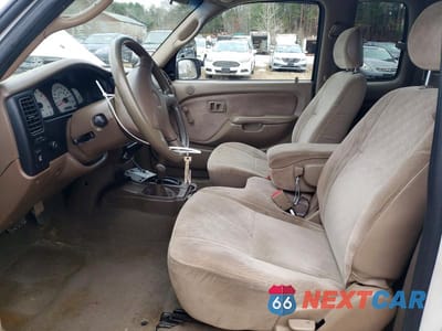 Zdjęcie 7 z 11 samochodu: 2003 TOYOTA TACOMA BASE VIN:5TEWM72N13Z227847 - miniatura