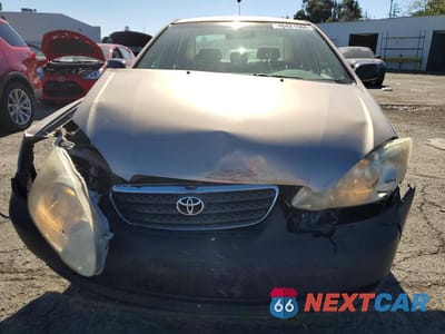 Piąte zdjęcie samochodu w środku: 2005 TOYOTA COROLLA CE VIN:1NXBR32E85Z411375 - miniatura