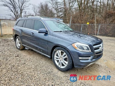 Czwarte zdjęcie samochodu z boku: 2013 MERCEDES-BENZ GL 450 4MATIC VIN:4JGDF7CE9DA227781 - miniatura