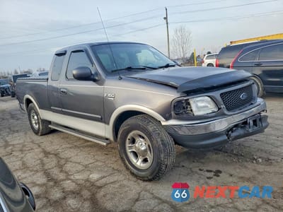 Czwarte zdjęcie samochodu z boku: 2002 FORD F150 VIN:2FTRX17L52CA13413 - miniatura