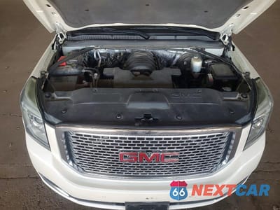 Zdjęcie 12 z 12 samochodu: 2015 GMC YUKON DENALI VIN:1GKS2CKJ8FR139425 - miniatura