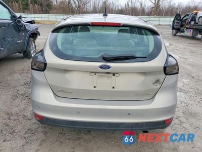 Zdjęcie 6 z 12 samochodu: 2016 FORD FOCUS TITANIUM VIN:1FADP3N2XGL302922 - miniatura