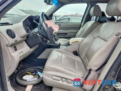 Zdjęcie 7 z 13 samochodu: 2011 HONDA PILOT EXLN VIN:5FNYF4H7XBB009481 - miniatura