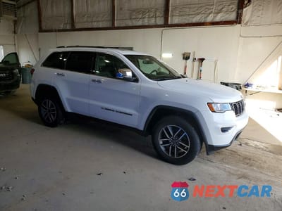 Czwarte zdjęcie samochodu z boku: 2022 JEEP GRAND CHEROKEE LIMITED VIN:1C4RJFBG0NC119223 - miniatura