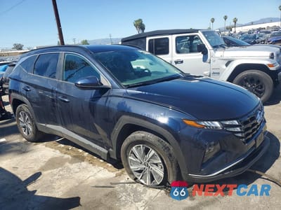 Czwarte zdjęcie samochodu z boku: 2024 HYUNDAI TUCSON HYBRID BLUE VIN:KM8JBCD10RU202728 - miniatura