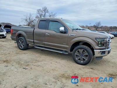 Czwarte zdjęcie samochodu z boku: 2015 FORD F150 SUPER CAB VIN:1FTEX1CP0FFB57159 - miniatura