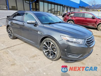 Czwarte zdjęcie samochodu z boku: 2016 FORD TAURUS LIMITED VIN:1FAHP2F92GG133169 - miniatura