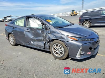 Czwarte zdjęcie samochodu z boku: 2022 TOYOTA PRIUS PRIME LIMITED VIN:JTDKAMFP1N3217127 - miniatura