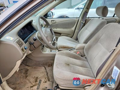 Zdjęcie 7 z 12 samochodu: 2000 TOYOTA COROLLA VE VIN:2T1BR12E0YC366071 - miniatura
