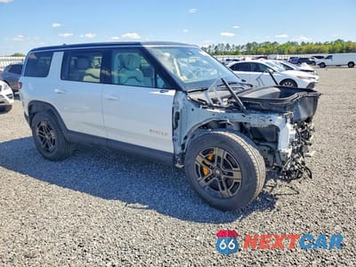 Czwarte zdjęcie samochodu z boku: 2023 RIVIAN R1S ADVENTURE VIN:7PDSGABA8PN016999 - miniatura