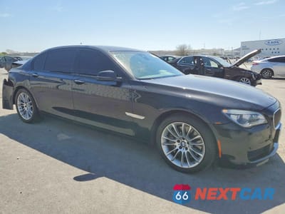 Czwarte zdjęcie samochodu z boku: 2015 BMW 750 LXI VIN:WBAYF8C57FD654550 - miniatura