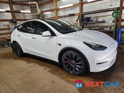 Czwarte zdjęcie samochodu z boku: 2022 TESLA MODEL Y VIN:7SAYGDEF9NF372094 - miniatura