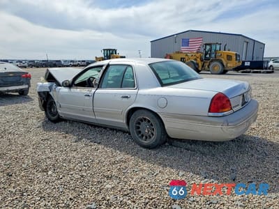 Drugie zdjęcie samochodu z przodu: 1999 FORD CROWN VICTORIA LX VIN:2FAFP74W9XX127327 - miniatura