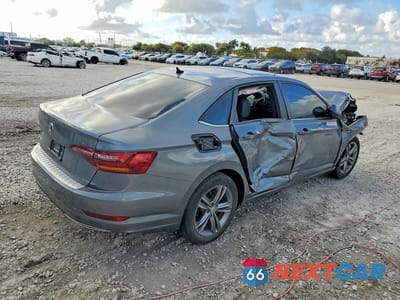 Trzecie zdjęcie samochodu z tyłu: 2019 VOLKSWAGEN JETTA S VIN:3VWC57BU2KM237190 - miniatura