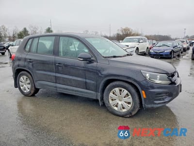 Czwarte zdjęcie samochodu z boku: 2013 VOLKSWAGEN TIGUAN S VIN:WVGBV7AX6DW536867 - miniatura