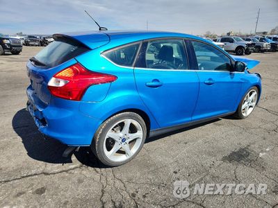 Trzecie zdjęcie samochodu z tyłu: 2012 FORD FOCUS TITANIUM VIN:1FAHP3N2XCL279010 - miniatura