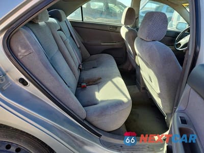 Zdjęcie 10 z 11 samochodu: 2003 TOYOTA CAMRY LE VIN:4T1BE32K13U179314 - miniatura