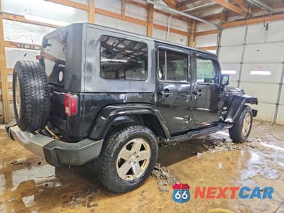 Trzecie zdjęcie samochodu z tyłu: 2009 JEEP WRANGLER UNLIMITED SAHARA VIN:1J4GA59149L749734 - miniatura