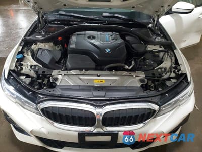 Zdjęcie 11 z 12 samochodu: 2021 BMW 330E VIN:3MW5P7J00M8B60963 - miniatura