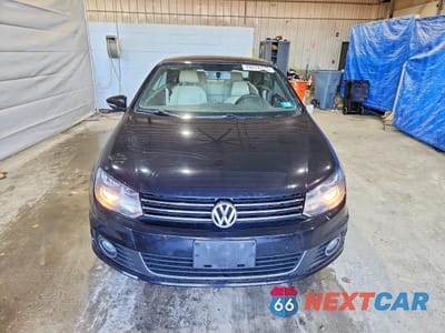 Piąte zdjęcie samochodu w środku: 2015 VOLKSWAGEN EOS KOMFORT VIN:WVWBW8AH0FV005530 - miniatura