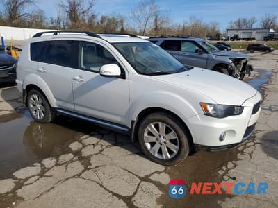 Czwarte zdjęcie samochodu z boku: 2013 MITSUBISHI OUTLANDER SE VIN:JA4JT3AW7DU005222 - miniatura