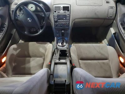 Zdjęcie 8 z 12 samochodu: 2002 NISSAN MAXIMA GXE VIN:JN1DA31D22T424785 - miniatura