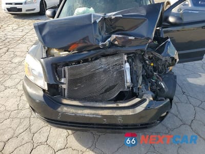 Zdjęcie 11 z 12 samochodu: 2010 DODGE CALIBER MAINSTREET VIN:1B3CB3HA9AD594492 - miniatura