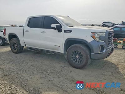 Czwarte zdjęcie samochodu z boku: 2021 GMC SIERRA K1500 AT4 VIN:1GTU9EET5MZ381630 - miniatura