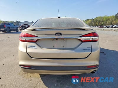 Zdjęcie 6 z 12 samochodu: 2017 FORD FUSION SE HYBRID VIN:3FA6P0LUXHR357059 - miniatura