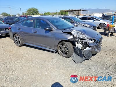 Czwarte zdjęcie samochodu z boku: 2022 NISSAN SENTRA SR VIN:3N1AB8DV6NY212369 - miniatura