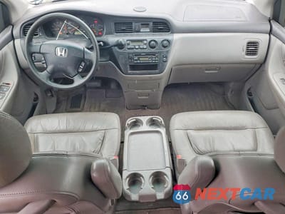 Zdjęcie 8 z 13 samochodu: 2002 HONDA ODYSSEY EXL VIN:2HKRL18952H515783 - miniatura