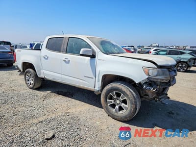 Czwarte zdjęcie samochodu z boku: 2016 CHEVROLET COLORADO Z71 VIN:1GCGSDE18G1284936 - miniatura
