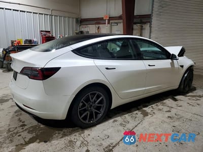 Trzecie zdjęcie samochodu z tyłu: 2022 TESLA MODEL 3 VIN:5YJ3E1EA2NF170410 - miniatura