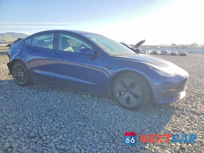 Czwarte zdjęcie samochodu z boku: 2021 TESLA MODEL 3 VIN:5YJ3E1EB5MF848896 - miniatura