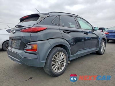 Trzecie zdjęcie samochodu z tyłu: 2018 HYUNDAI KONA SEL VIN:KM8K62AA1JU081686 - miniatura