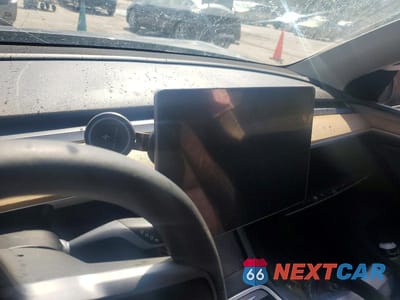 Zdjęcie 9 z 13 samochodu: 2023 TESLA MODEL Y VIN:7SAYGDEE7PA196525 - miniatura