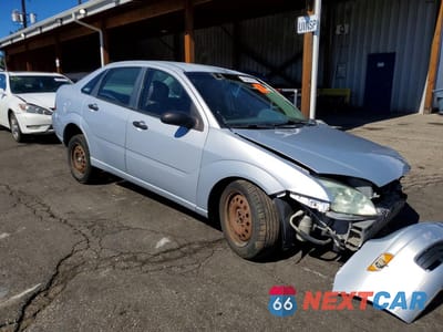 Czwarte zdjęcie samochodu z boku: 2005 FORD FOCUS ZX4 VIN:1FAFP34N35W271822 - miniatura
