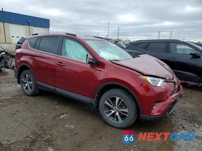 Czwarte zdjęcie samochodu z boku: 2018 TOYOTA RAV4 XLE VIN:2T3RFREV3JW800402 - miniatura