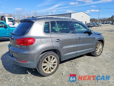 Trzecie zdjęcie samochodu z tyłu: 2014 VOLKSWAGEN TIGUAN S VIN:WVGBV3AX6EW555994 - miniatura