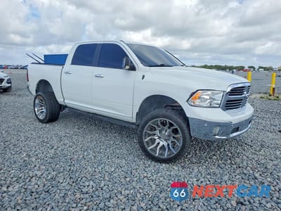 Czwarte zdjęcie samochodu z boku: 2017 RAM 1500 SLT VIN:1C6RR6LT8HS696040 - miniatura