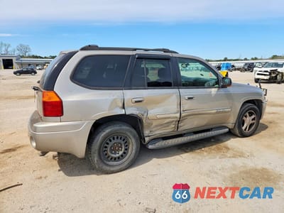 Trzecie zdjęcie samochodu z tyłu: 2002 GMC ENVOY VIN:1GKDS13S322488631 - miniatura