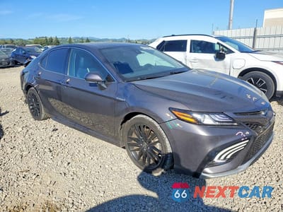 Czwarte zdjęcie samochodu z boku: 2021 TOYOTA CAMRY HYBRID XSE VIN:4T1K31AK1MU565793 - miniatura