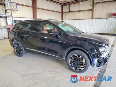 Czwarte zdjęcie samochodu z boku: 2023 KIA SPORTAGE SX-PRESTIGE VIN:5XYK5CAF1PG030577 - miniatura