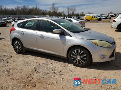 Czwarte zdjęcie samochodu z boku: 2012 FORD FOCUS SE VIN:1FAHP3K26CL176347 - miniatura