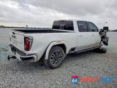 Trzecie zdjęcie samochodu z tyłu: 2022 GMC SIERRA K2500 AT4 VIN:1GT49PE71NF148734 - miniatura