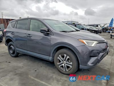 Czwarte zdjęcie samochodu z boku: 2017 TOYOTA RAV4 LE VIN:JTMZFREV7HJ721260 - miniatura