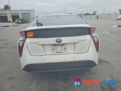 Zdjęcie 6 z 12 samochodu: 2018 TOYOTA PRIUS TWO VIN:JTDKBRFU6J3062617 - miniatura