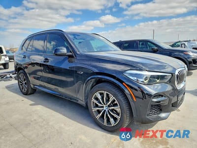Czwarte zdjęcie samochodu z boku: 2022 BMW X5 XDRIVE45E VIN:5UXTA6C05N9K71260 - miniatura
