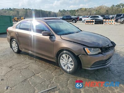 Czwarte zdjęcie samochodu z boku: 2015 VOLKSWAGEN JETTA SE VIN:3VWD17AJ0FM329234 - miniatura